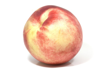 single peach in close up