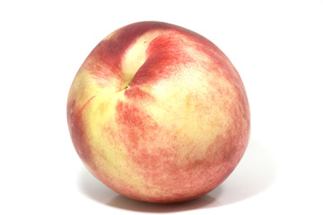 single peach in close up