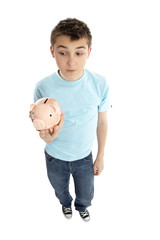 Boy holding a piggy bank money box