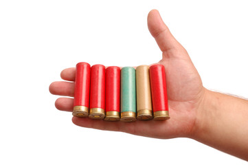 Man's hand with the hunting cartridges