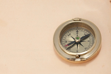 Fototapeta na wymiar close-up view of vintage brass compass