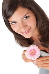 Happy teenager with gerber daisy