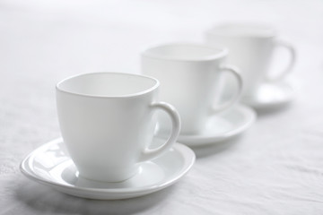 Three white cups.
