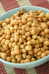 fried batter pearls in a blue bowl ready to eat