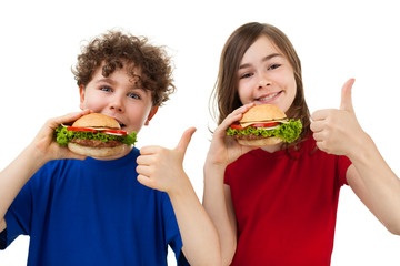 Kids eating healthy sandwiches showing Ok sign, isolated