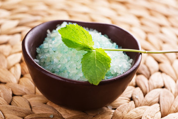 Bath salt and sprig of mint
