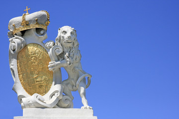 Obraz premium Löwenfigur mit Wappen