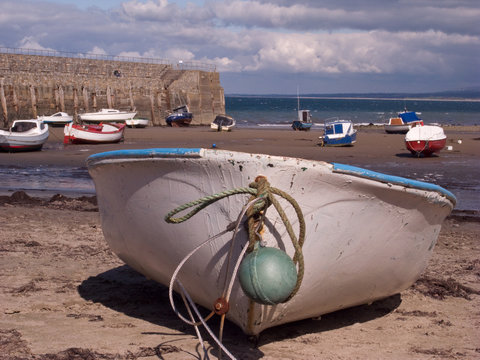 Boat with mooring buoy.