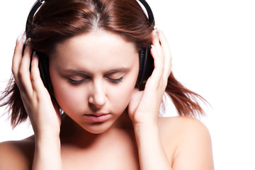 Fototapeta premium Beautiful woman listening music