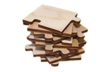 Wooden puzzle on a pile