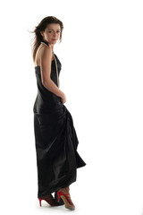 Girl in black dress isolated on white background