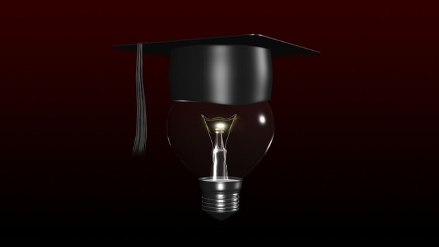 Light bulb with a graduated hat on. Concept of smart head