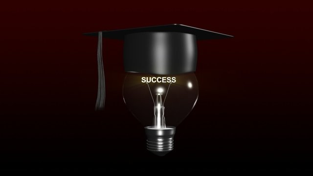 Light bulb with a graduated hat on. Concept of clever head