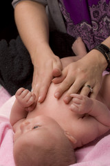 Fototapeta na wymiar Baby Massage after a bath