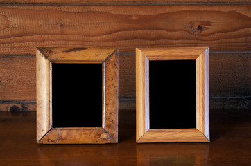 old photo frames on table