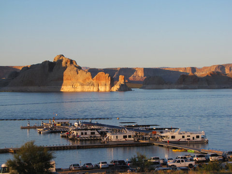 Houseboat On Lake Powell At Sunset