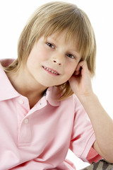 Studio Portrait of Smiling Boy