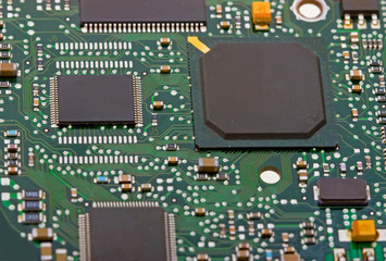 Close-up green circuit board to background
