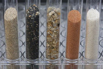 sand samples in laboratory testing tubes