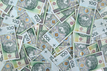 background made of polish 100 zloty banknotes