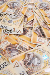 background made of polish 200 zloty banknotes - obrazy, fototapety, plakaty