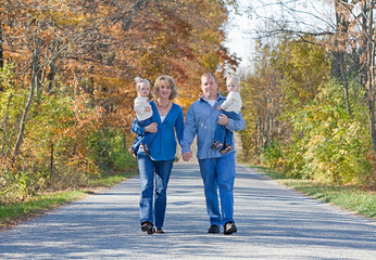 Family Taking a Walk in the Autumn