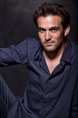 Fototapeta premium Young attractive brunette twenties caucasian man