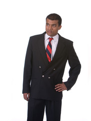 Middle Eastern man in suit shot against white background
