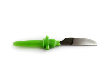 Obraz premium Couteau vert pour enfant sur fond blanc