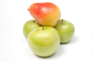 Three green apples and a pear, isolated on white