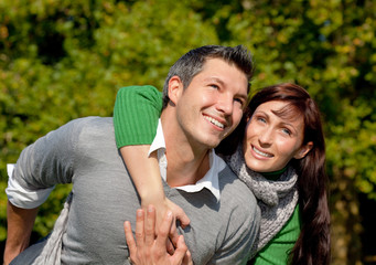 healthy natural piggy back family couple