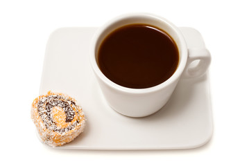 cup of coffee and candy on a saucer