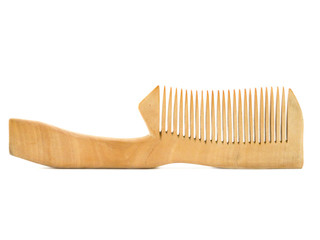 Wooden comb, isolated over white.