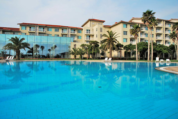 Fototapeta na wymiar Huge swimming pool with luxurious resorts