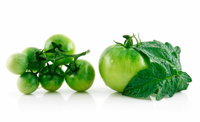 Ripe Wet Green Tomatoes with Leaves Isolated on White