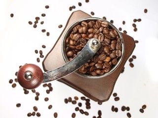 Top view of coffee grinder on white background