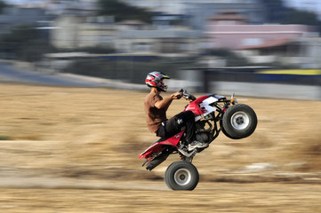 Obraz premium Extreme driver on quadbike