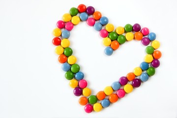 Colorful hearts made from sweets isolated on a white background