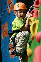 Boy on climbing wall