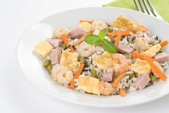 Plate of shrimp fried rice peas ham omelette