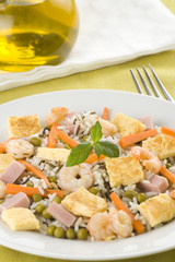 Plate of shrimp fried rice peas ham omelette