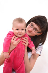 The young woman in points holds the kid