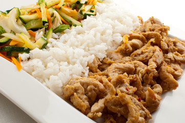 Grilled meat, rice and vegetables