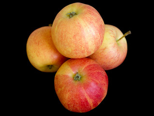 Fresh autumn apples on black