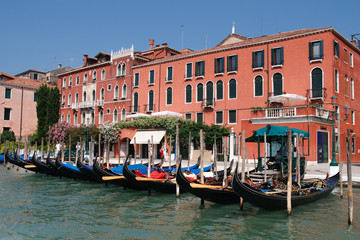 Fototapeta na wymiar Parked Gondolas at the Grand Canal, Venice, Italy