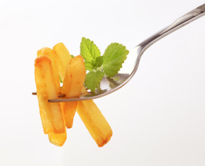 French fries on a fork