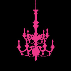 Pink chandelier on black background.