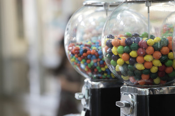 Gum ball dispenser