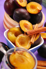 preparing preserves of plums