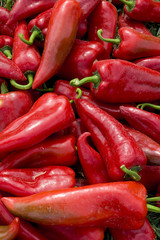 organic red pepers on grass